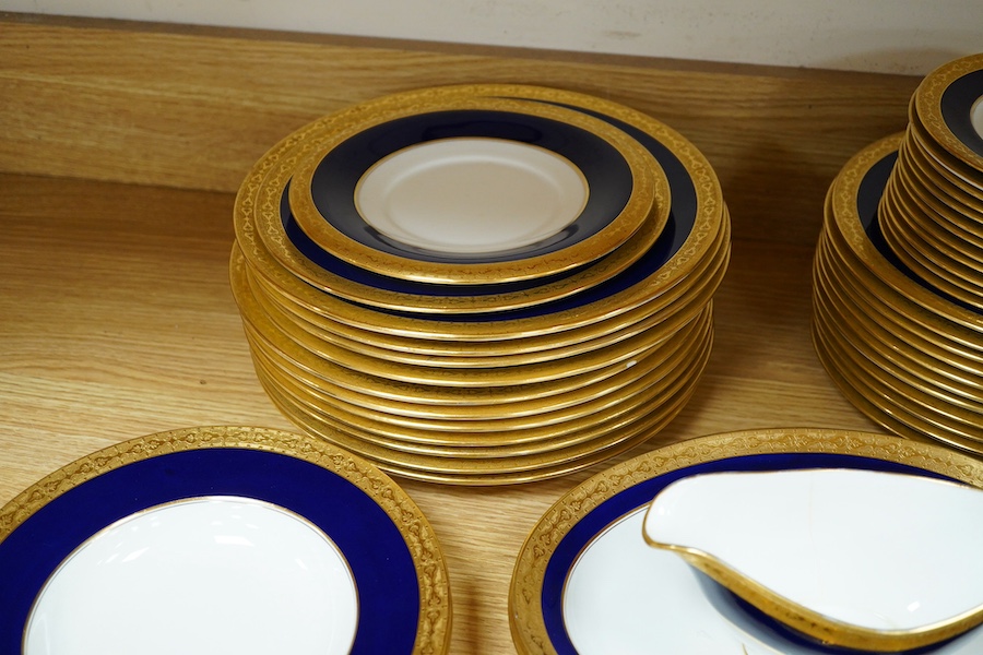 Mintons for Stonier & Co. gilt and blue part dinner service. Condition - mostly fair to good, some pieces with cracks